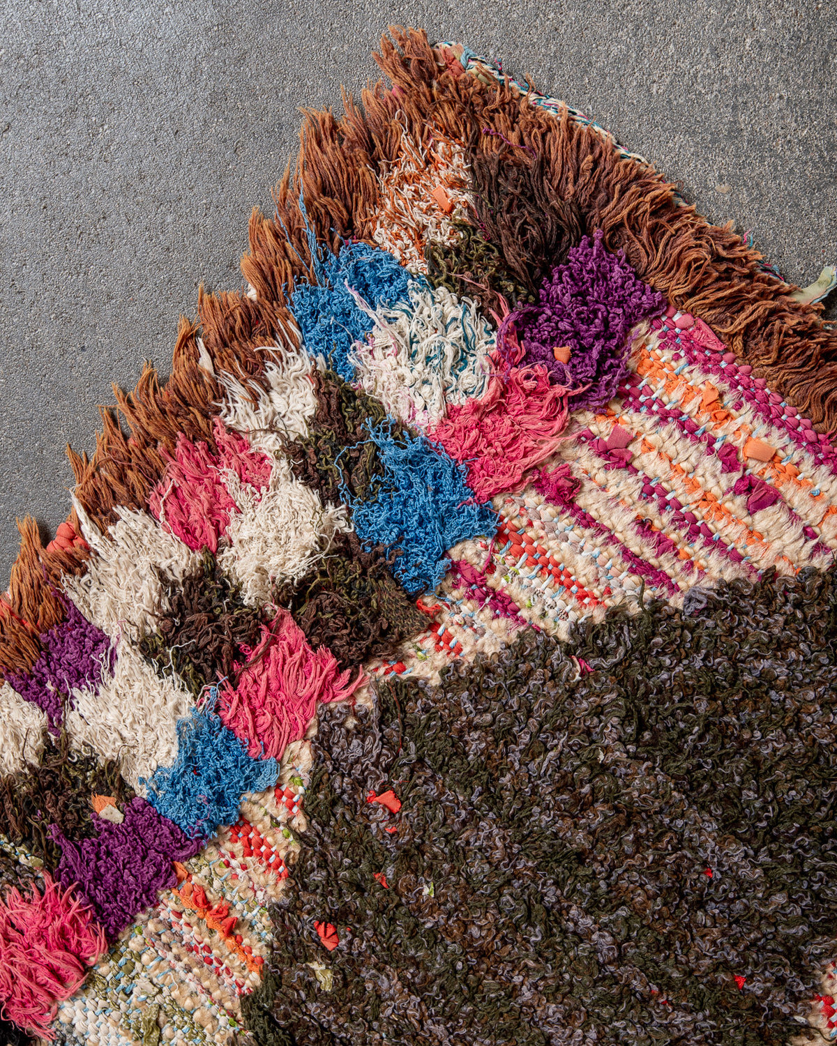 Modern designer vintage handcrafted Berber rug from Morocco. Boucherouite runner rug with beautiful colors and patterns.