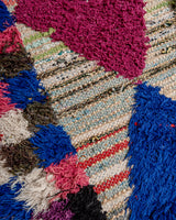 Modern designer vintage handcrafted Berber rug from Morocco. Boucherouite runner rug with beautiful colors and patterns.