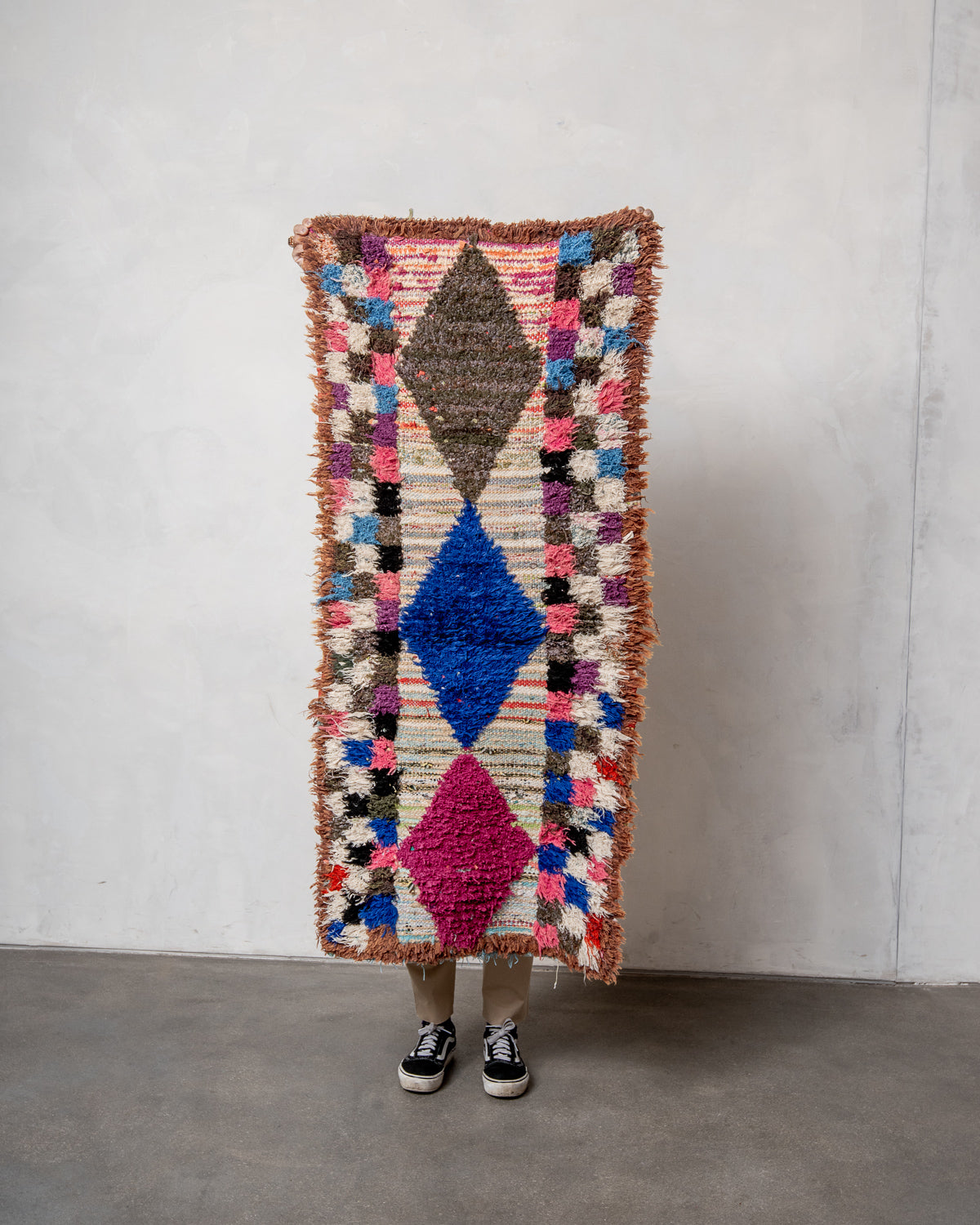Modern designer vintage handcrafted Berber rug from Morocco. Boucherouite runner rug with beautiful colors and patterns.