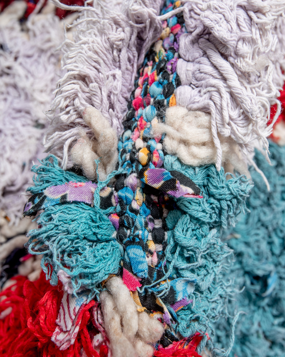 Modern designer vintage handcrafted Berber rug from Morocco. Boucherouite runner rug with beautiful colors and patterns.