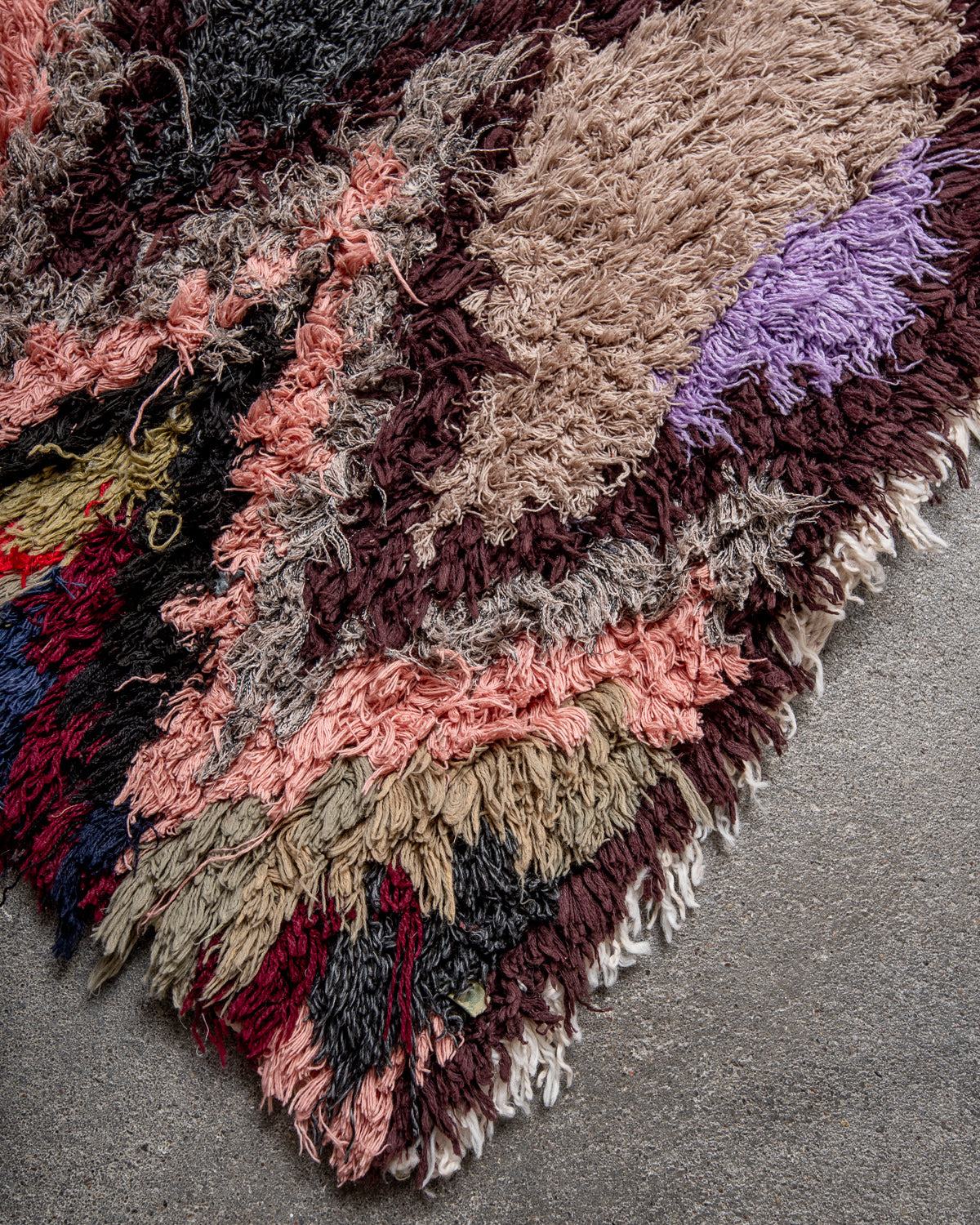 Modern designer vintage handcrafted Berber rug from Morocco. Boucherouite runner rug with beautiful colors and patterns.