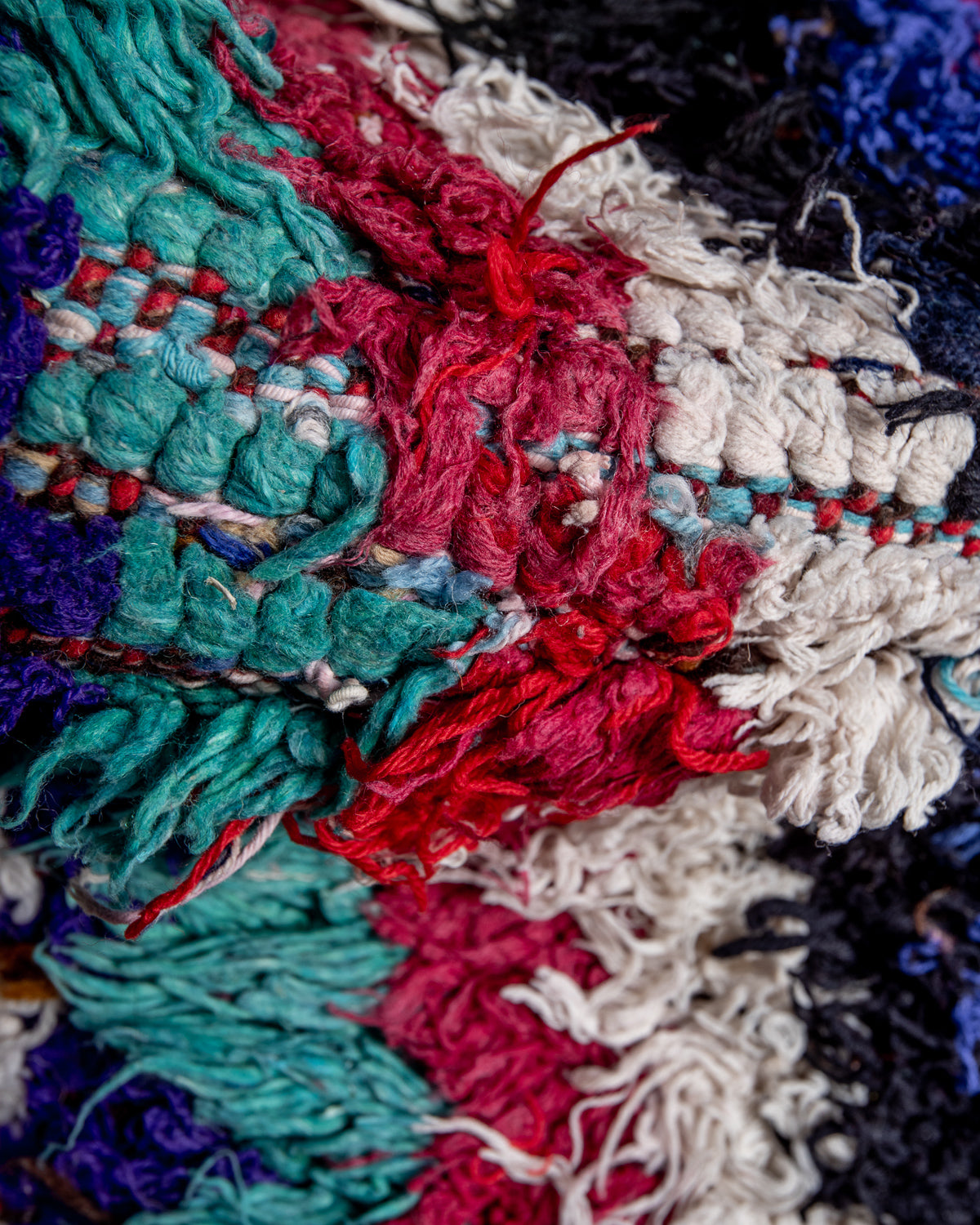 Modern designer vintage handcrafted Berber rug from Morocco. Boucherouite runner rug with beautiful colors and patterns.