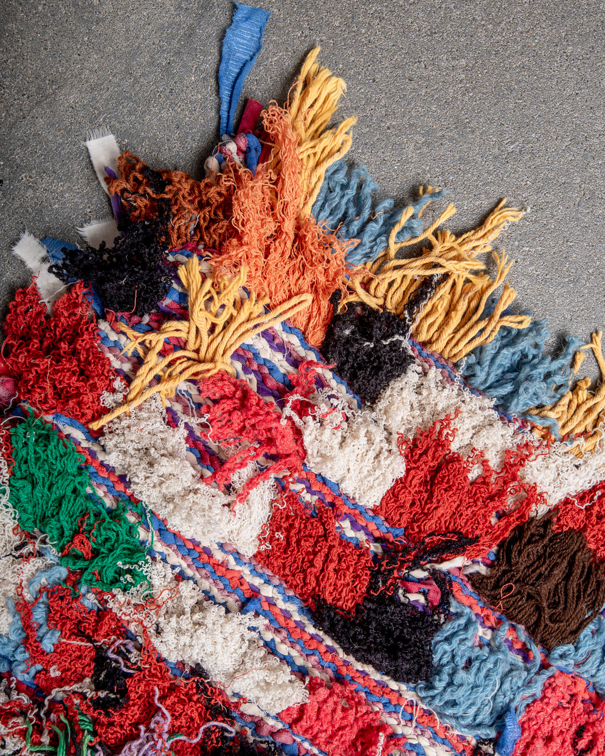 Modern designer vintage handcrafted Berber rug from Morocco. Boucherouite runner rug with beautiful colors and patterns.