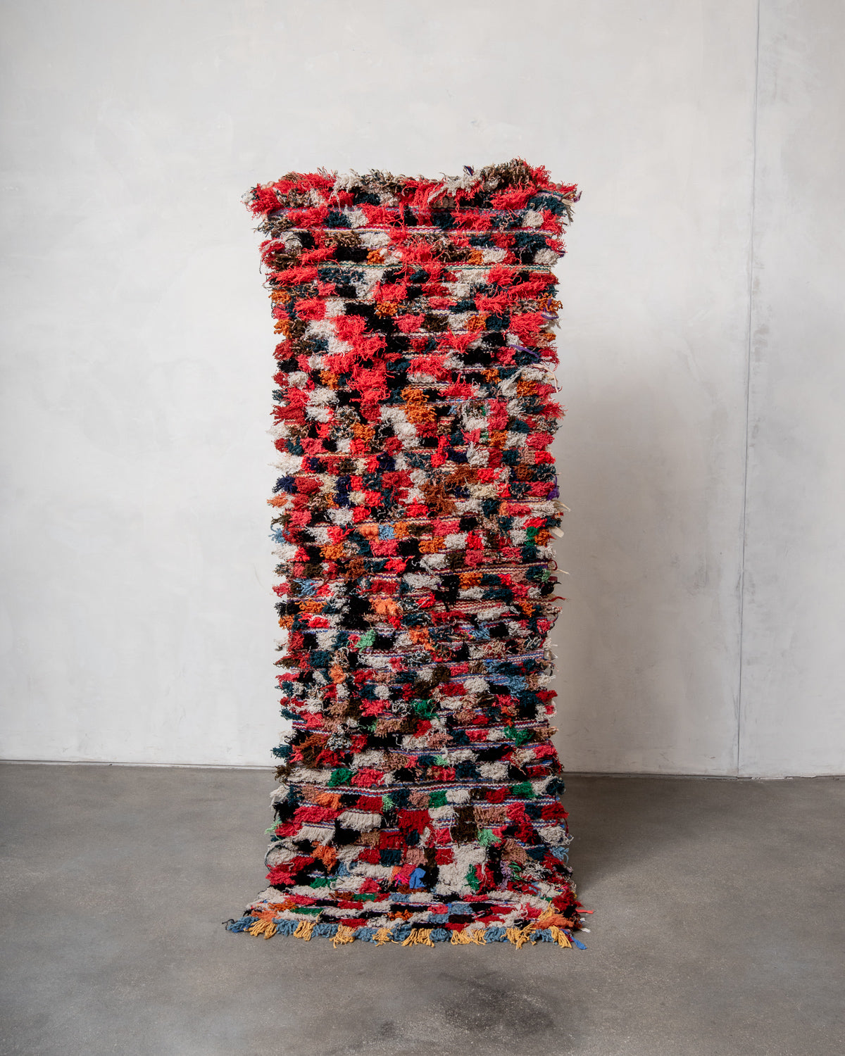 Modern designer vintage handcrafted Berber rug from Morocco. Boucherouite runner rug with beautiful colors and patterns.