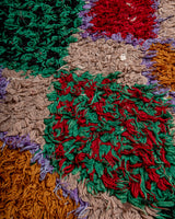 Modern designer vintage handcrafted Berber rug from Morocco. Boucherouite runner rug with beautiful colors and patterns.