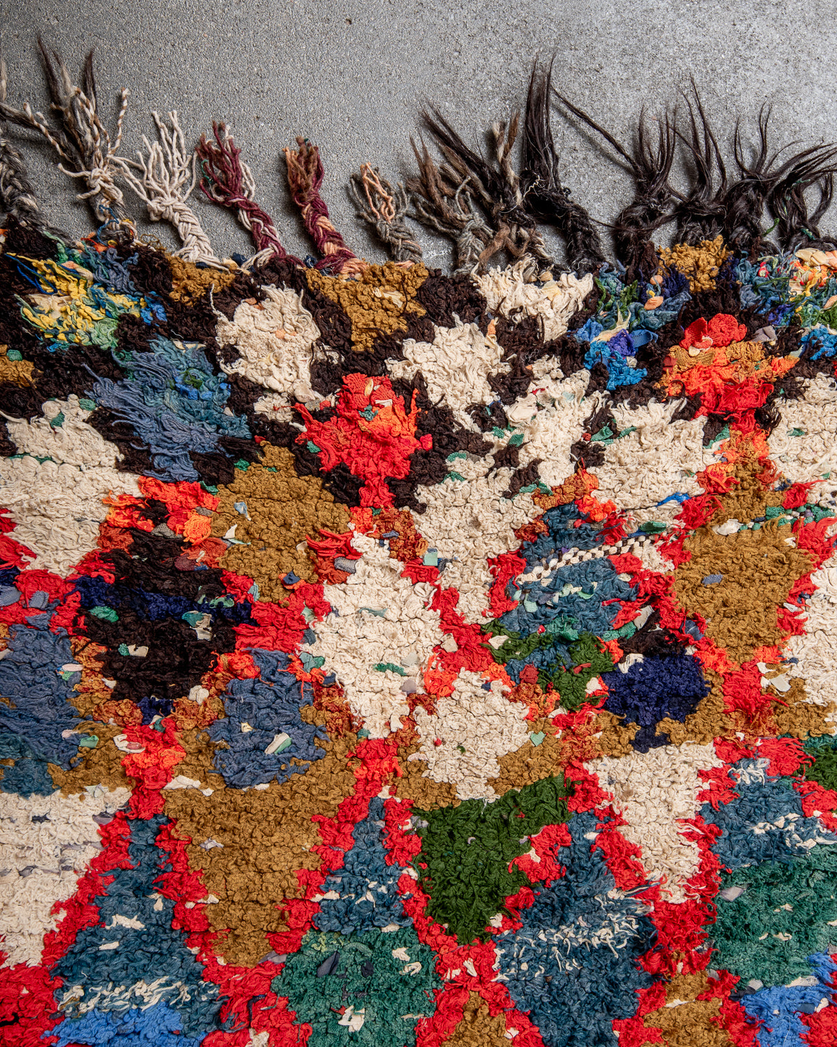 Modern designer vintage handcrafted Berber rug from Morocco. Boucherouite with beautiful colors and patterns.