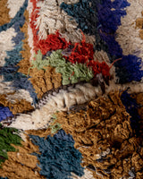 Modern designer vintage handcrafted Berber rug from Morocco. Boucherouite with beautiful colors and patterns.