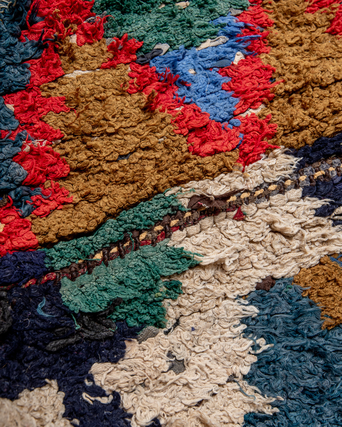 Modern designer vintage handcrafted Berber rug from Morocco. Boucherouite with beautiful colors and patterns.