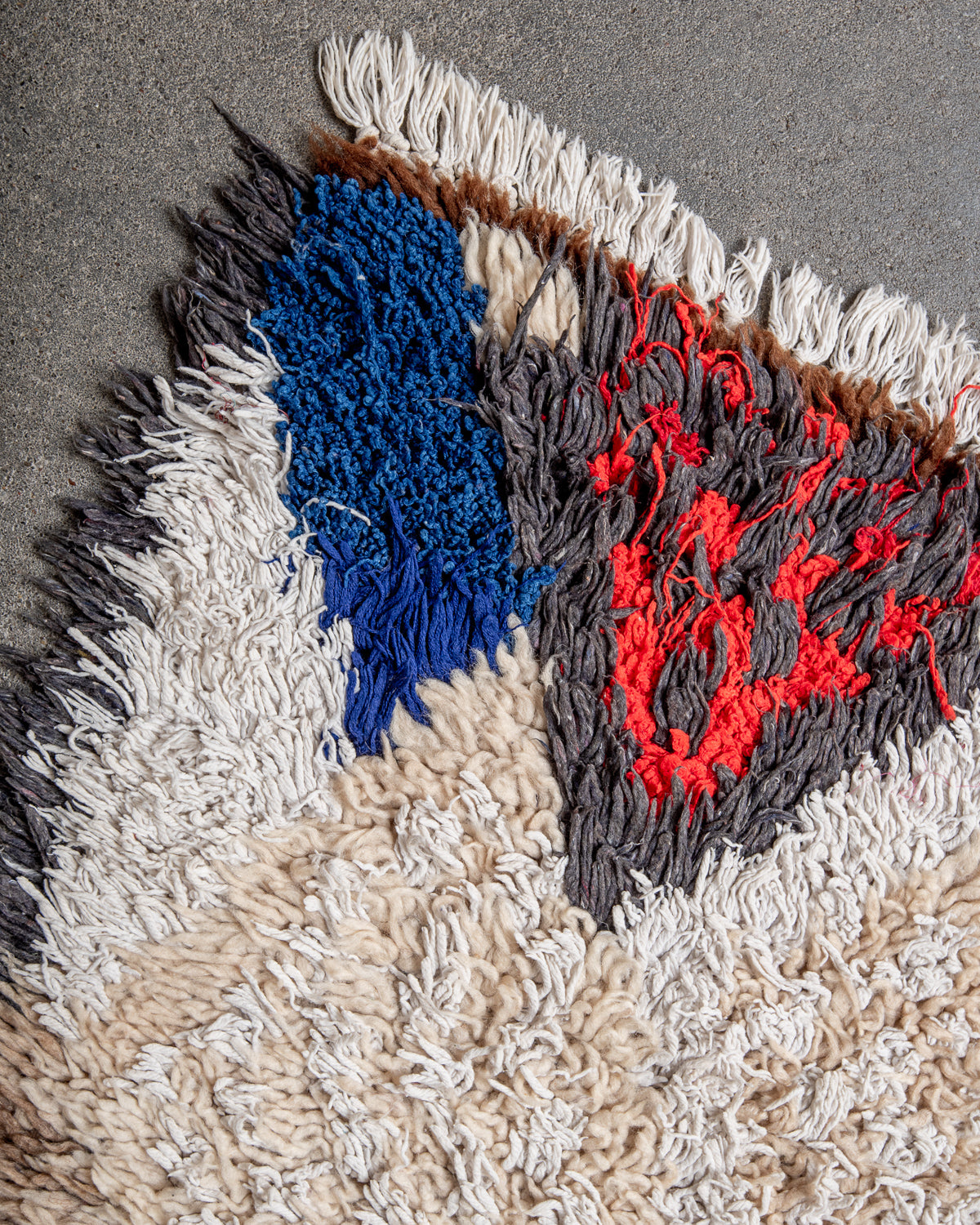 Modern designer vintage handcrafted Berber rug from Morocco. Boucherouite with beautiful colors and patterns.