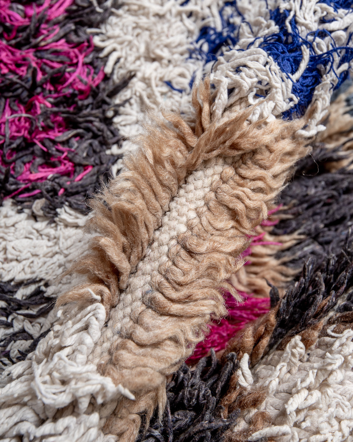 Modern designer vintage handcrafted Berber rug from Morocco. Boucherouite with beautiful colors and patterns.