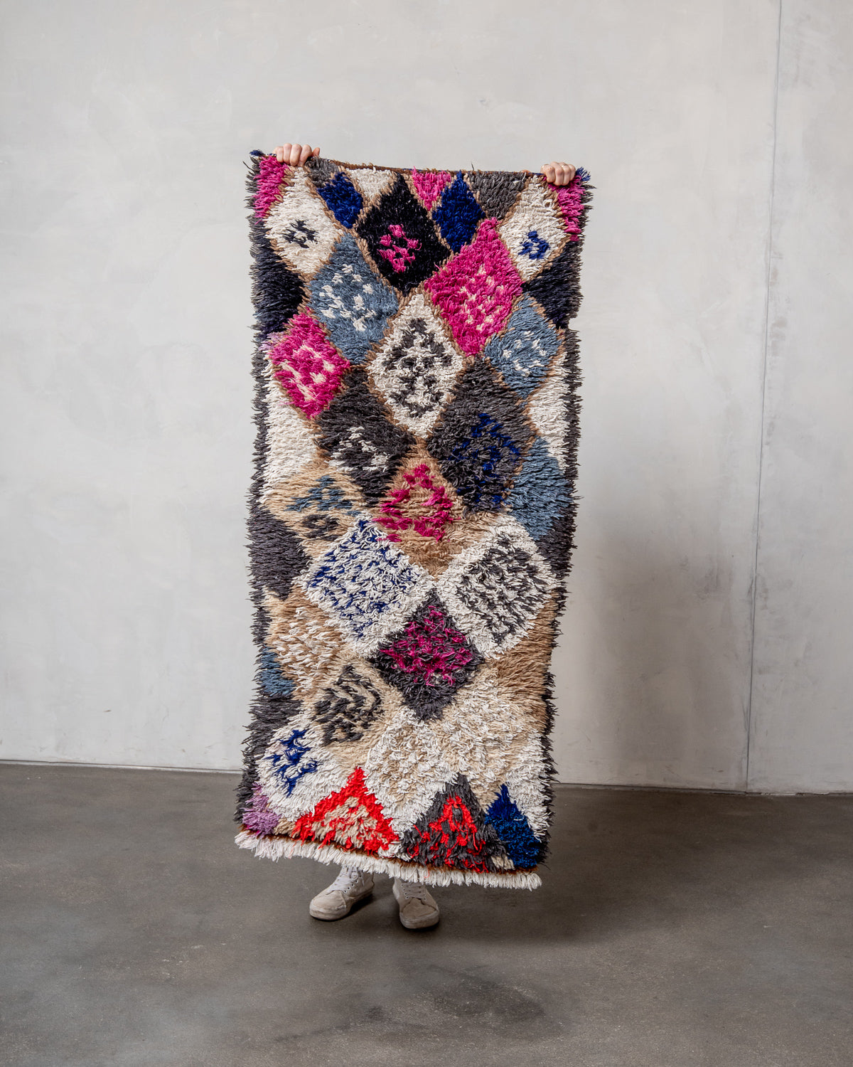 Modern designer vintage handcrafted Berber rug from Morocco. Boucherouite with beautiful colors and patterns.