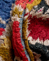 Modern designer vintage handcrafted Berber rug from Morocco. Boucherouite with beautiful colors and patterns.