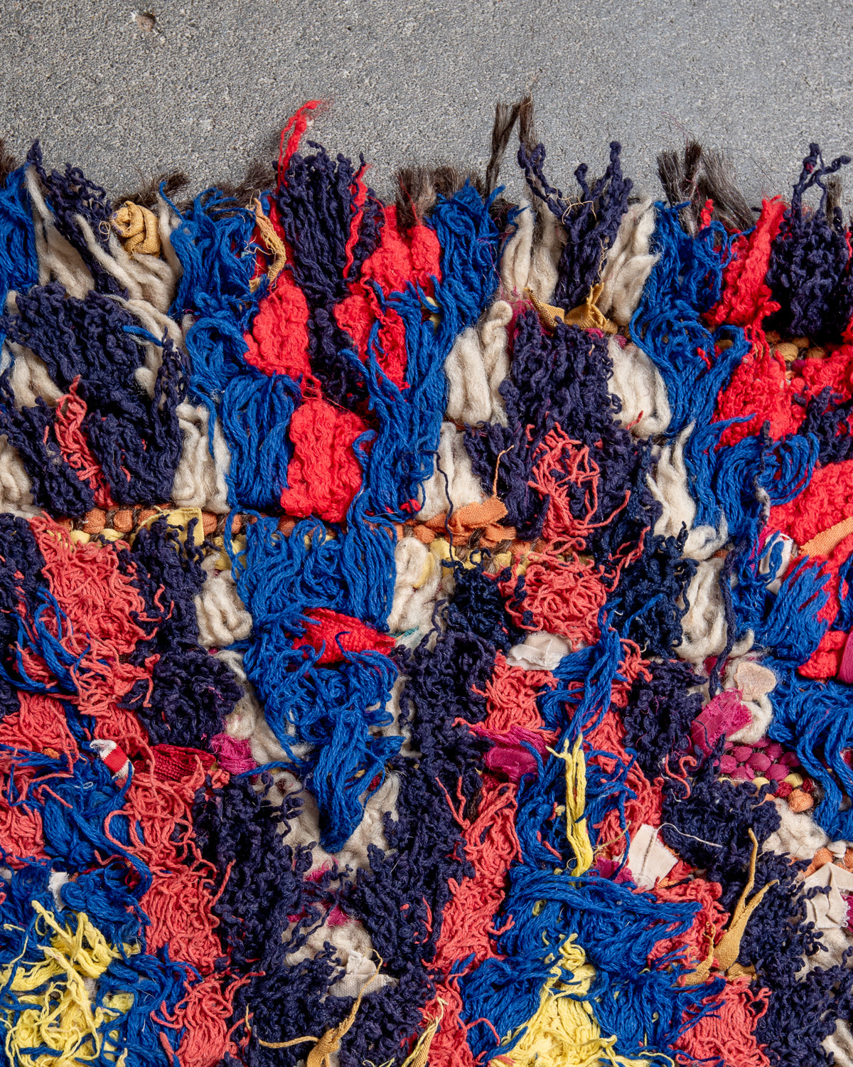 Modern designer vintage handcrafted Berber rug from Morocco. Boucherouite with beautiful colors and patterns.