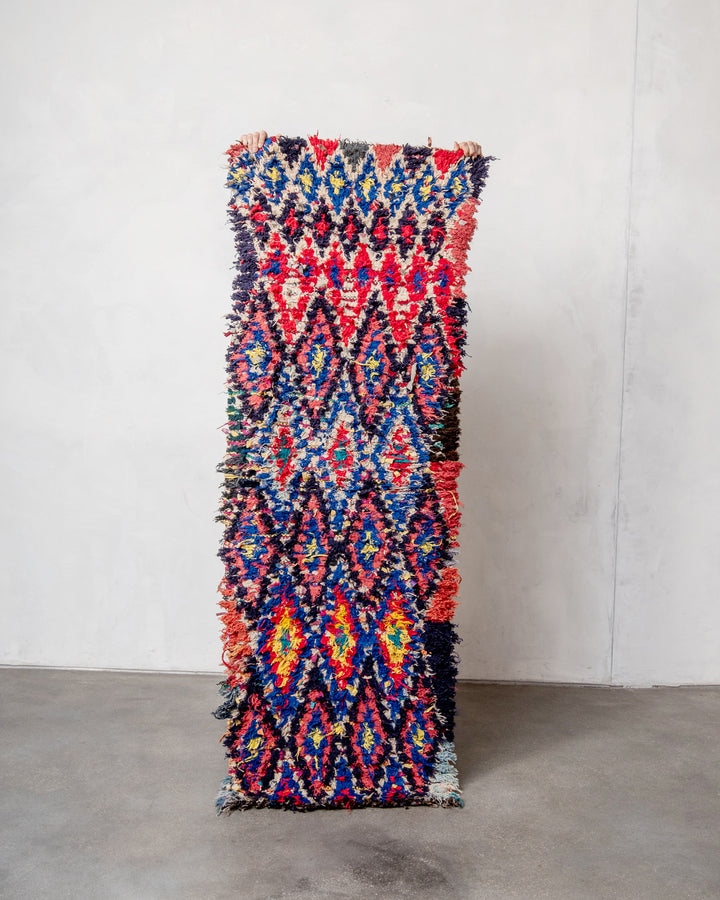 Modern designer vintage handcrafted Berber rug from Morocco. Boucherouite with beautiful colors and patterns.