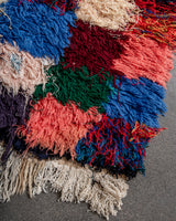 Modern designer vintage handcrafted Berber rug from Morocco. Boucherouite with beautiful colors and patterns.