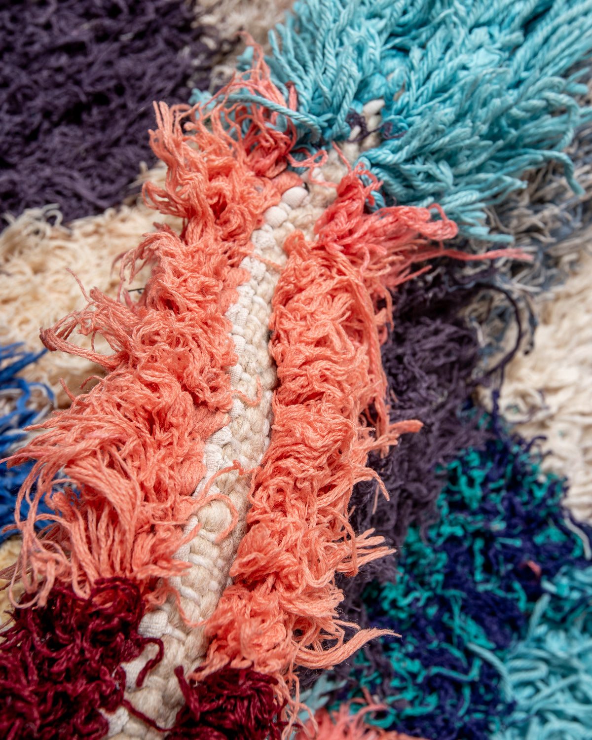 Modern designer vintage handcrafted Berber rug from Morocco. Boucherouite with beautiful colors and patterns.