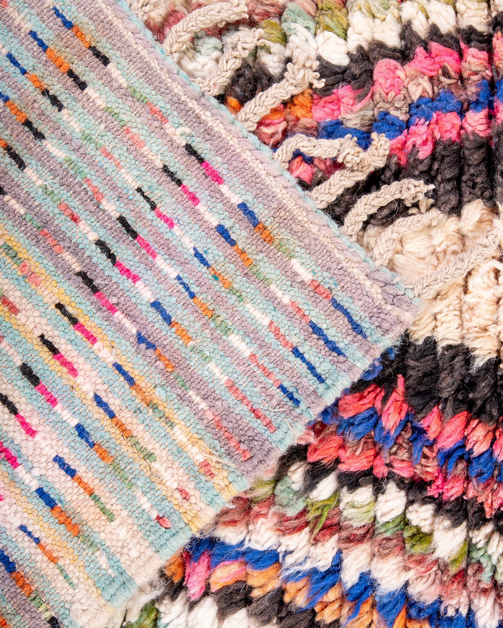 Modern designer handcrafted Berber rug from Morocco. Boujed with beautiful colors and patterns.