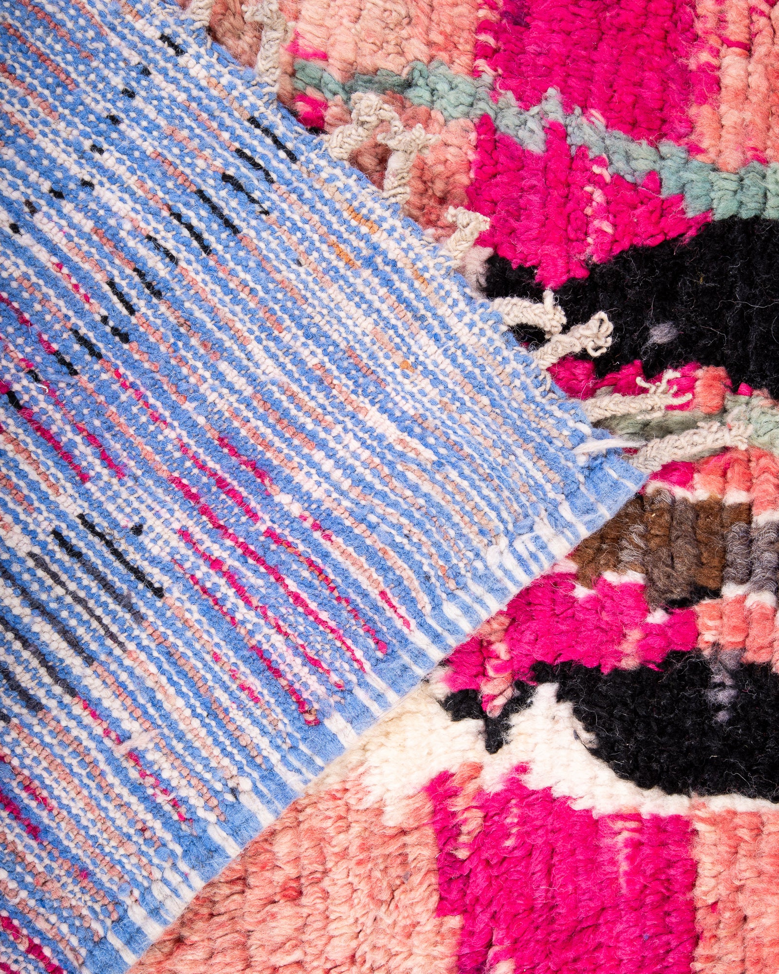 Modern designer handcrafted Berber rug from Morocco. Boujed with beautiful colors and patterns.