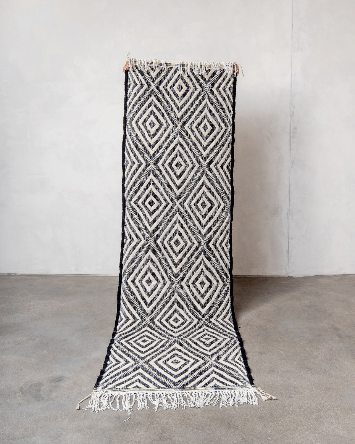 Modern, handcrafted Berber runner rug from Morocco. Flat-woven Kelim carpet in black and white design. Made of 100% wool.