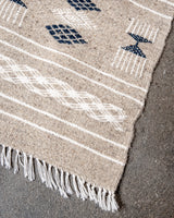 Modern, handcrafted Berber rug from Tunisia. Flat-woven Kelim carpet in black and white design. Made of 100% wool.