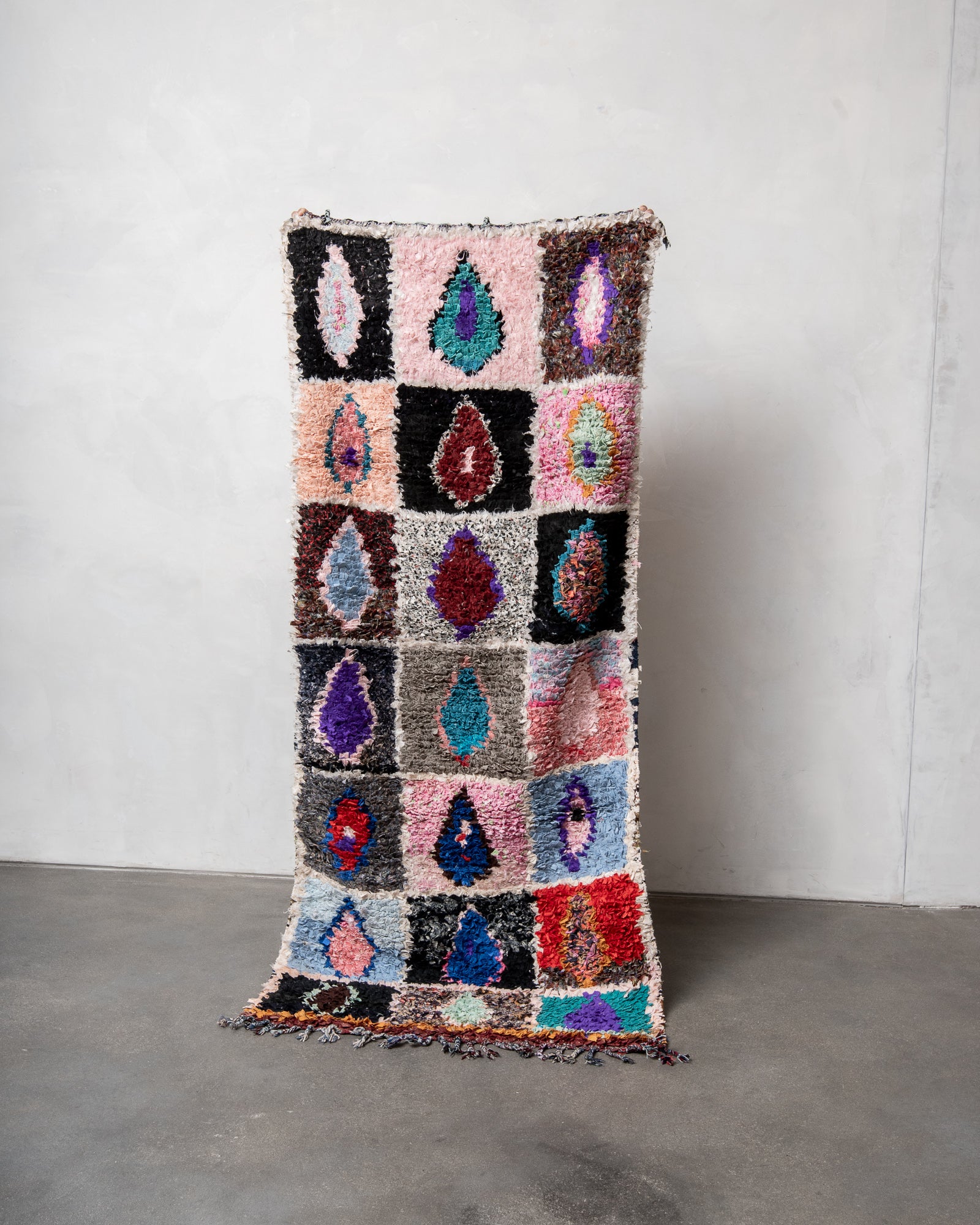 Modern designer vintage handcrafted cotton Berber rug from Morocco. Boucherouite with beautiful colors and patterns.