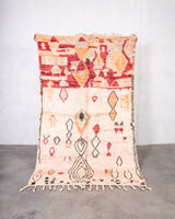 Modern, designer, handcrafted Berber rug from Morocco. Vintage carpet with beautiful colours and patterns and fluffy texture.