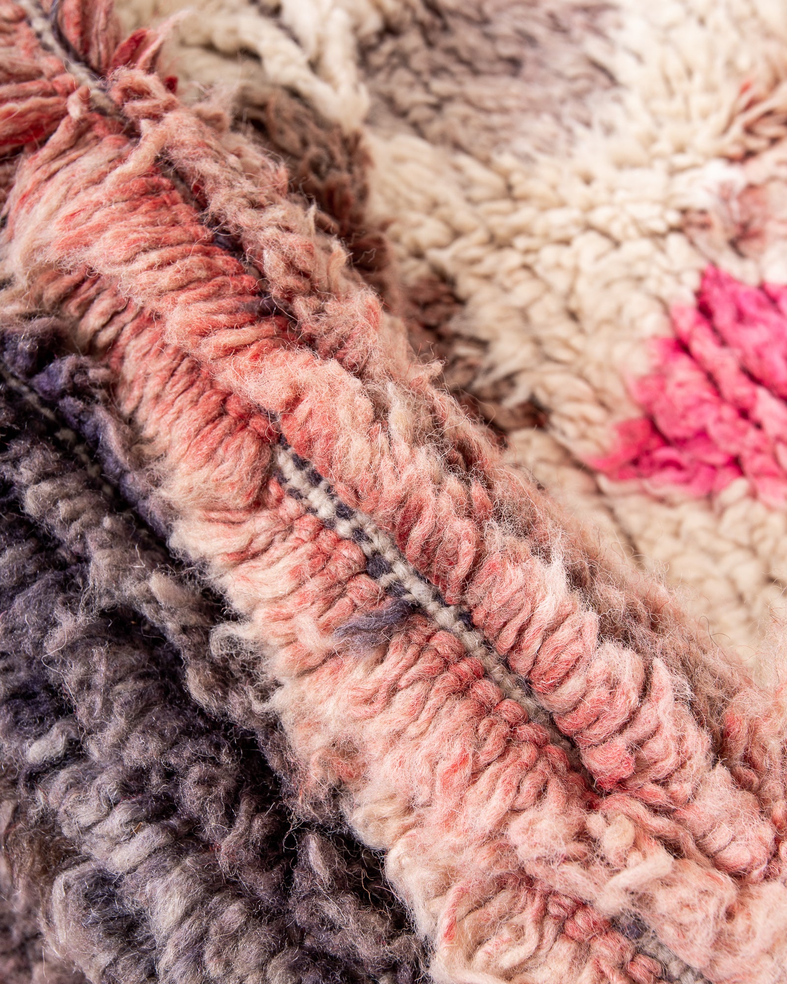 Modern, designer, handcrafted Berber rug from Morocco. Vintage carpet with beautiful colours and patterns and fluffy texture.