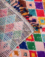 Modern, designer, handcrafted Berber rug from Morocco. Vintage carpet with beautiful colours and patterns and fluffy wool texture.