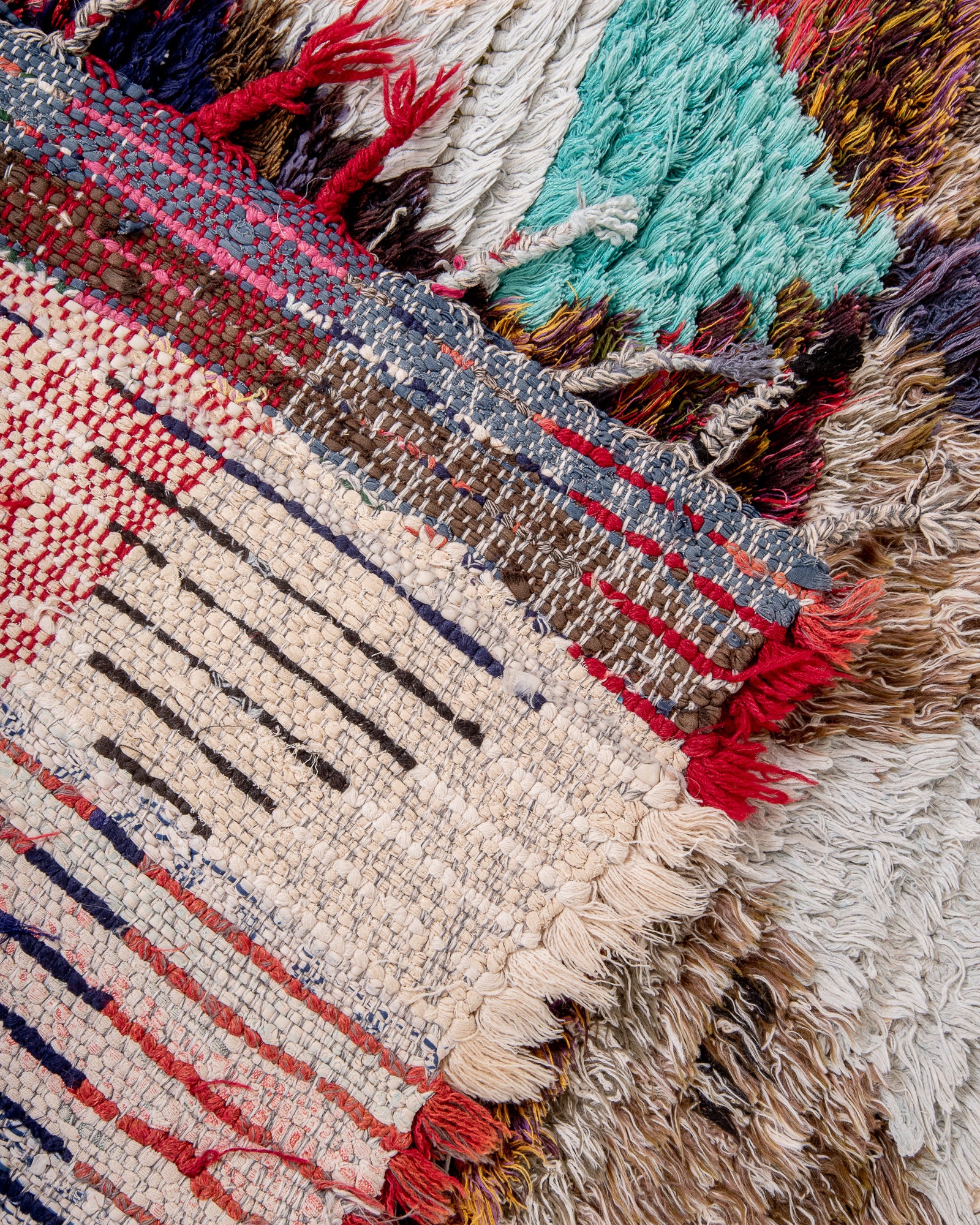 Modern, designer, handcrafted Berber rug from Morocco. Vintage carpet with beautiful colours and patterns and fluffy wool texture.