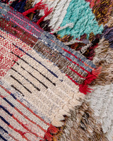 Modern, designer, handcrafted Berber rug from Morocco. Vintage carpet with beautiful colours and patterns and fluffy wool texture.